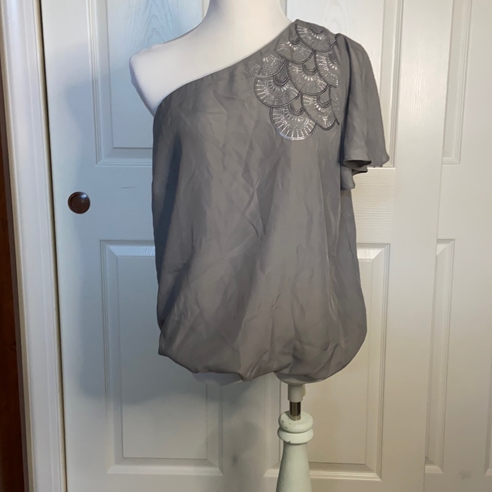 Asymmetrical sequined top